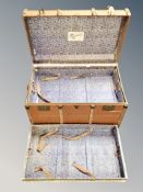 An early 20th century wooden bound shipping trunk