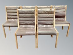 A set of six Scandinavian oak framed chairs with canvas upholstery and brown stitched leather