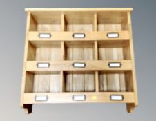 A contemporary oak spice rack,