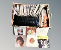 A box of 45 vinyl singles,