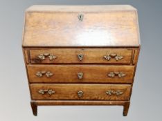 A 19th century oak bureau,