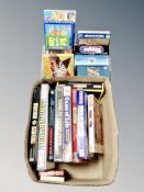 A box of assorted board games