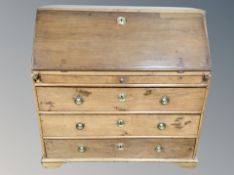 A 19th century oak bureau,