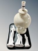 A Denby pottery table lamp together with three Royal Doulton images figures