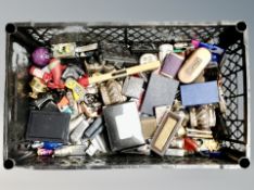 A crate of novelty lighters and further lighters