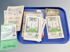 A collection of football programmes and football ephemera to include a postcard of Gateshead