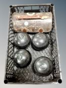 Four Henselite lawn bowls and two further in carry case