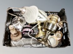 A crate containing oil lamp bases etc