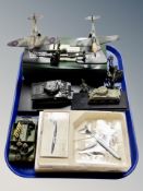 A group of die cast military vehicles, spitfire and Messerschmitt, tanks,