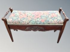 An Edwardian storage duet stool