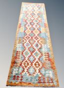 A Chobi kilim runner 294 cm x 88 cm