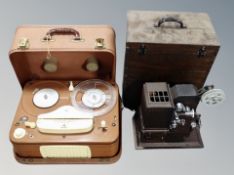 A Danish reel to reel together with a projector