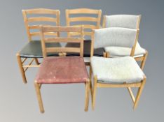 A pair of Danish blond oak chairs in grey upholstery together with three further single chairs