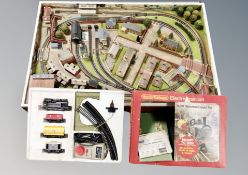 A Hornby Railways electric train set together with a model railway track 94 cm x 63 cm