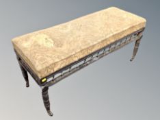 A Victorian ebonised duet stool