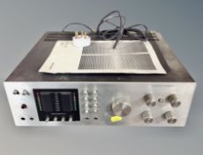 A Harman Kardon A402 amplifier / pre amplifier with manual