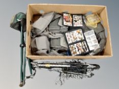 A Simms fishing gillet size XXL together with cases containing fishing flies,