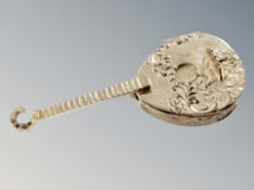 A silver mandolin pill box