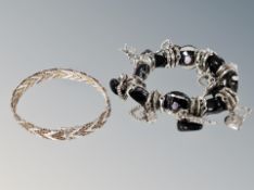 Two costume bracelets