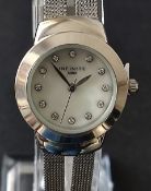 Lady's New stainless steel Infinite cocktail watch, with film seals. 20cm face.