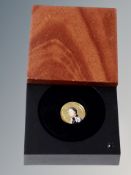 A 9ct golden jubilee enamel coin