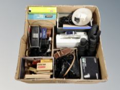 A box of vintage photographic equipment, cameras,