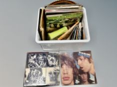 Box of a small collection of LP records and singles including The Rolling Stones