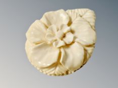 A carved bone pendant