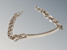 A silver identity bracelet