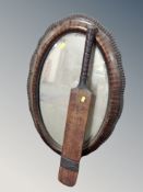 A 19th century mahogany oval scalloped edged mirror together with a vintage Herbert Sutcliffe