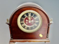 A mahogany eight day mantel clock