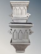 Two plastic Gothic style drain hoppers