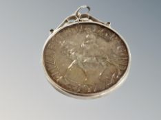 A 1977 crown in silver mount