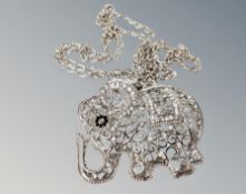 An elephant pendant on chain