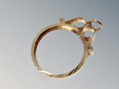 A silver coin pendant mount