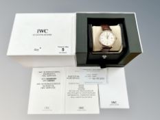 A gent's 18ct rose gold IWC Schaffhausen Portofino automatic calendar centre seconds wristwatch,