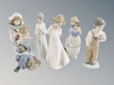 Six Nao figures including puppies birthday,