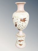 A Victorian porcelain transfer printed vase, on stand, depicting storks,