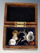 A wooden box with cufflinks etc