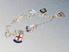 A silver bracelet and charms