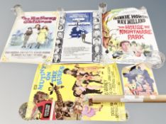 Five 20th century film posters : Mutiny on the Buses, Murder on the Oriental Express,