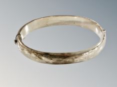 A silver vintage bangle