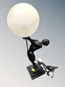 A contemporary Art Deco style table lamp,
