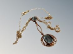 A pendant on 9ct gold chain