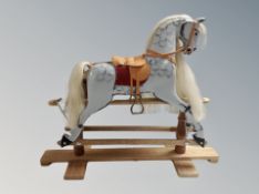 A miniature rocking horse,