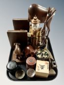 A tray of carved wooden animal figures, bookends, lidded trinket pots,