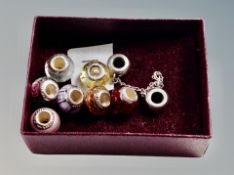 Eight silver and glass love links beads including silver duo with safety chain