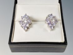 A silver stone set pair of earrings