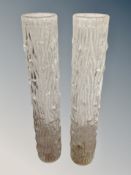 A pair of tall glass vases with bark effect finish, from Helsinki, 30.