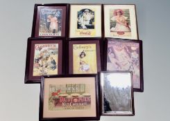 An antique mahogany shaving mirror together with seven advertising prints - Cadbury's, Coca Cola,